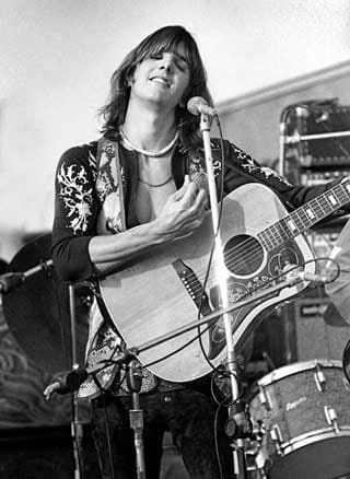 Gram Parsons on stage